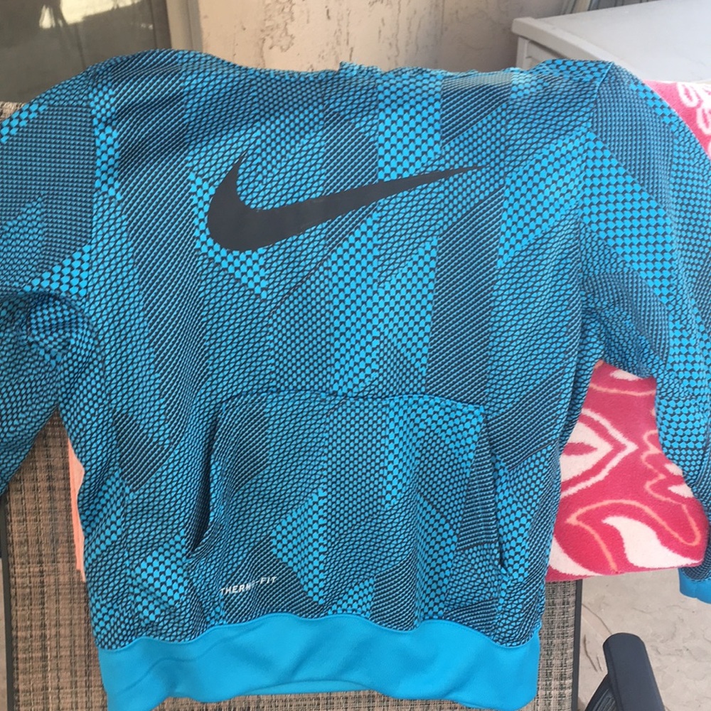 Nike turquoise and black hoodie.